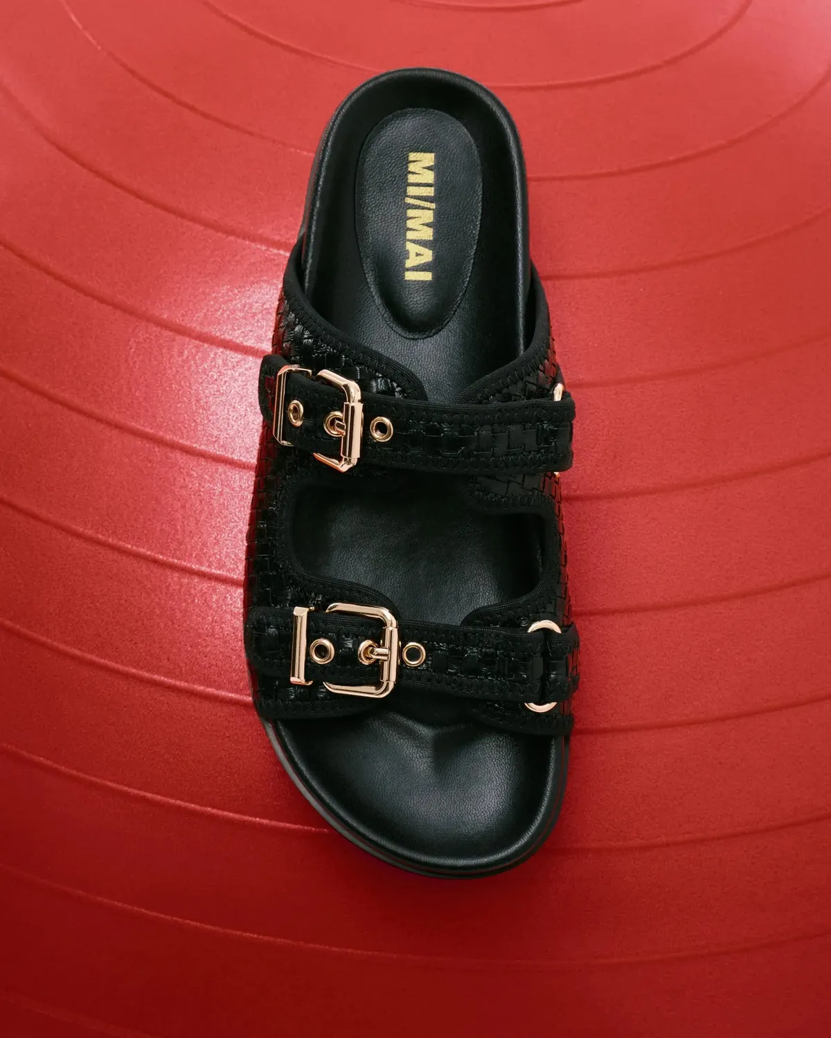 Mi/Mai Yayoi mules cuir noir brides boucles plates