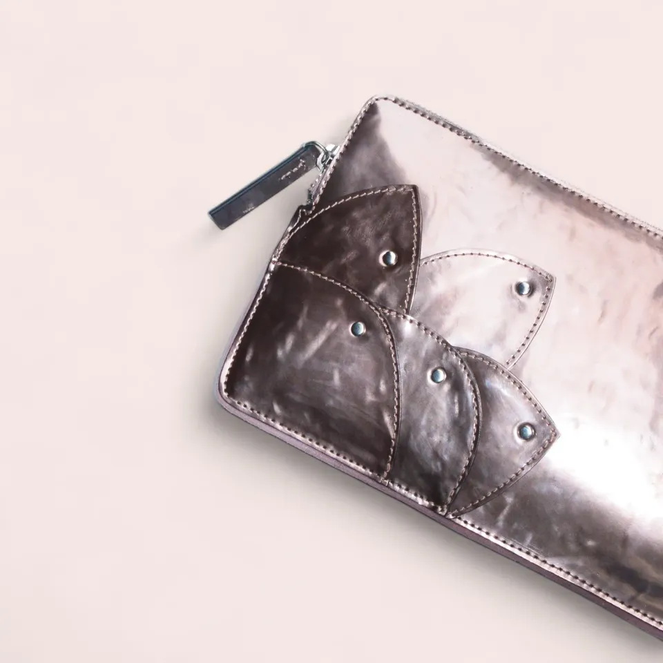 Karine Arabian Rose pochette cuir métal rose